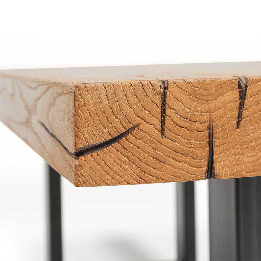 Tisch Seviona aus Wildeiche Massivholz geölt mit Bügelgestell aus Metall