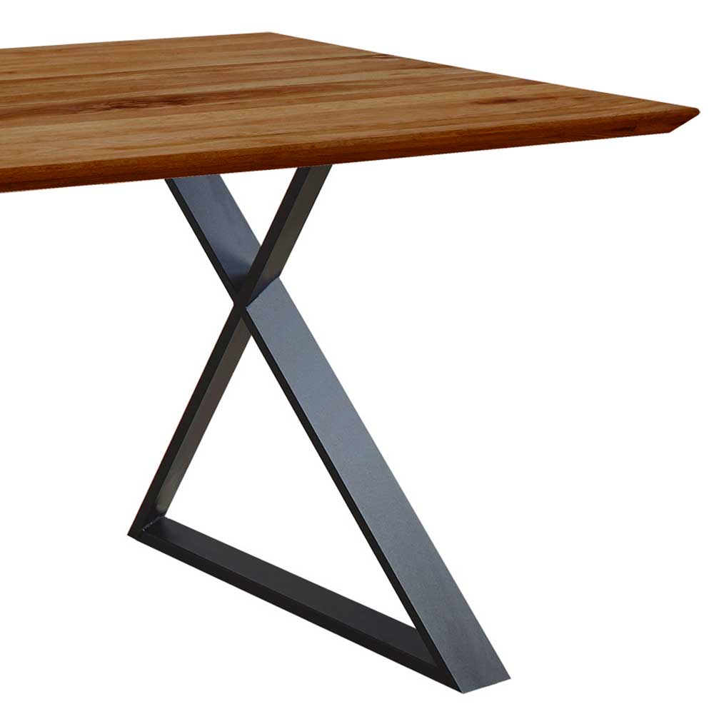Aussergewöhnlicher Tisch Nuvellas aus Zerreiche Massivholz braun mit Bügelgestell