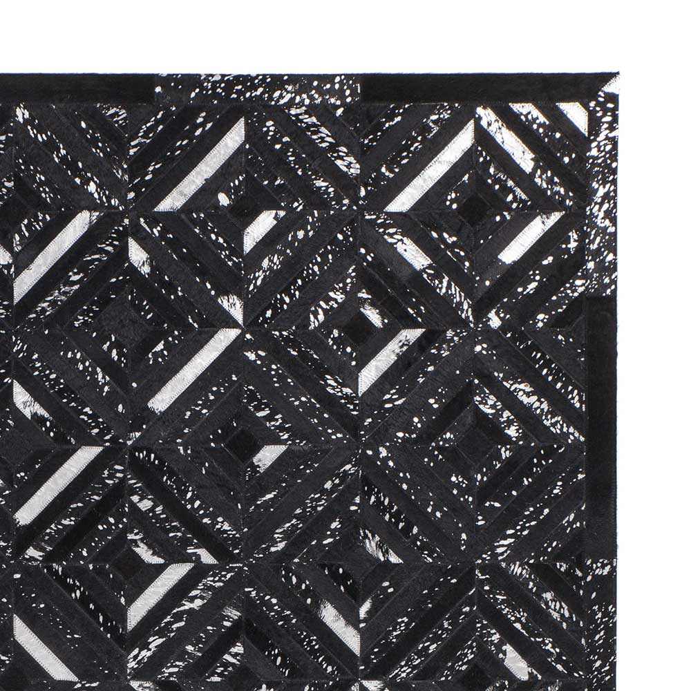 Teppich Elvadia in Schwarz und Silberfarben aus kurzem Echtfell