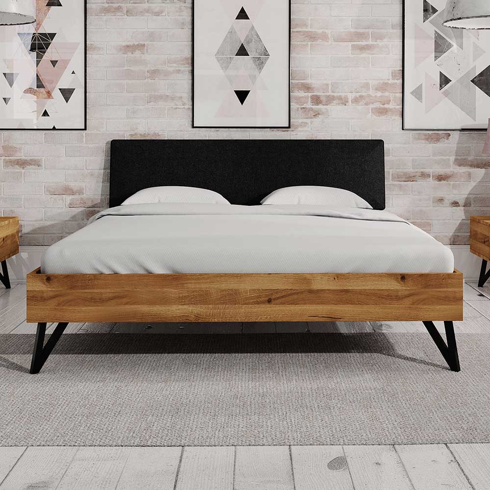 Design Doppelbett Cariasca aus Wildeiche Massivholz mit gepolstertem Kopfteil