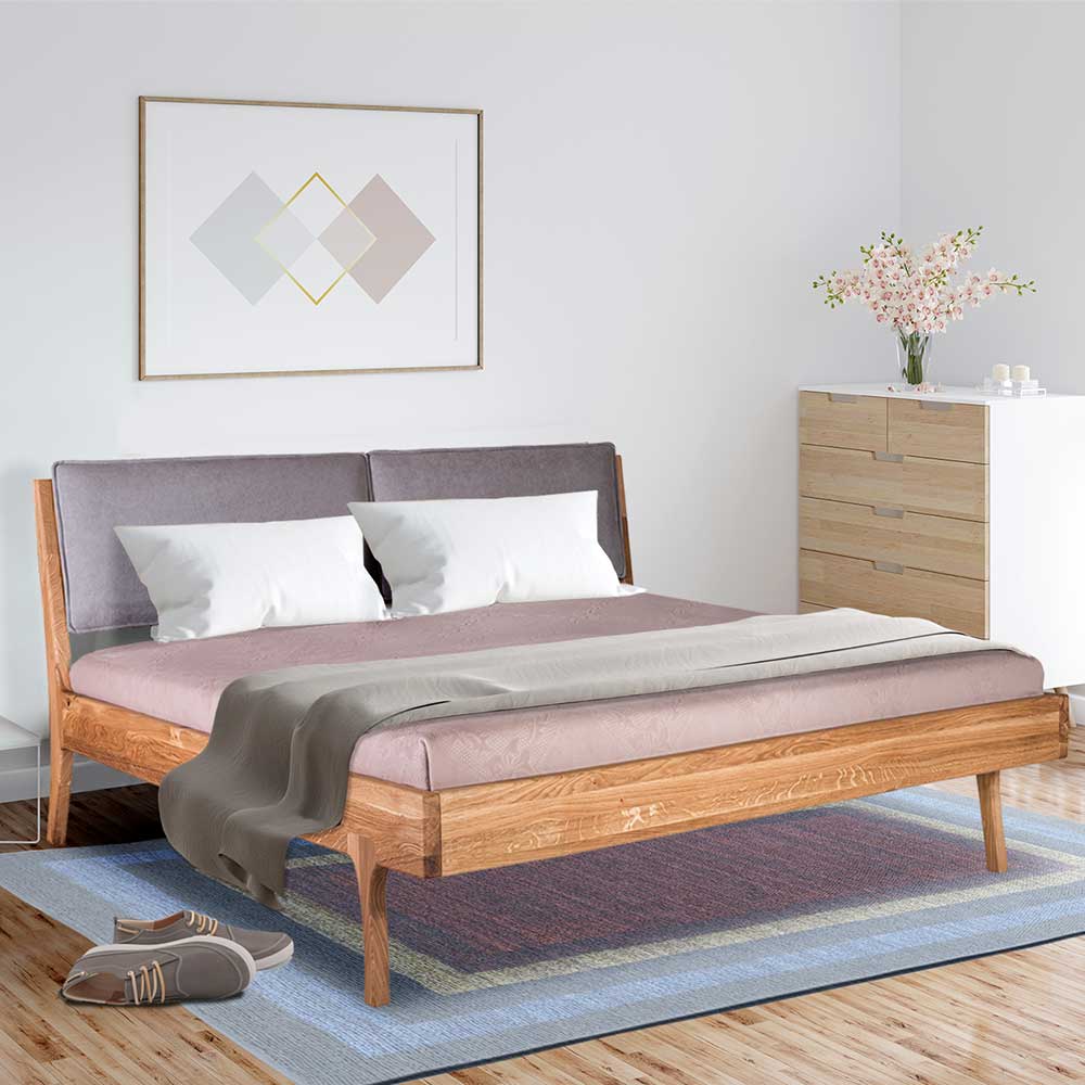 Doppel Bett Greeno aus Eiche Massivholz mit Polster Kopfteil