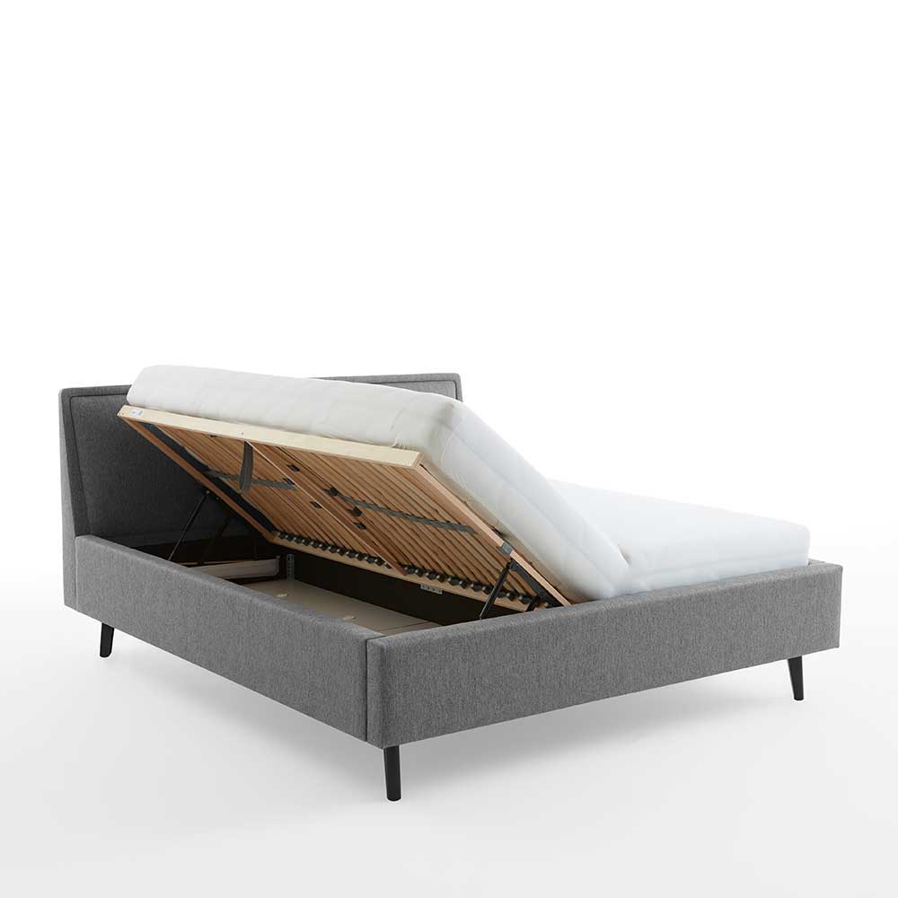Graues Polster Bett Cudalo mit 50 cm Einstiegshöhe und Vierfußgestell aus Holz