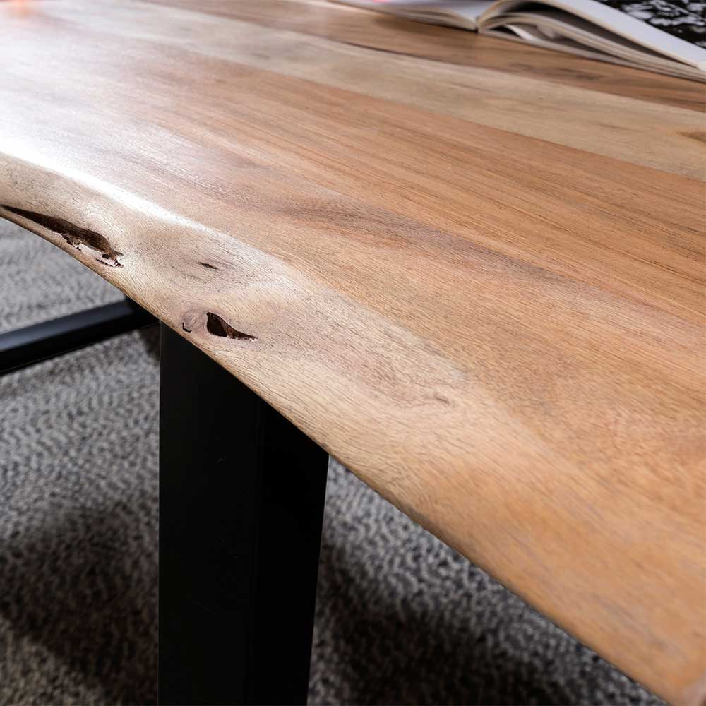 Baumkanten Holztisch Borgas aus Akazie Massivholz und Stahl lackiert und gewachst