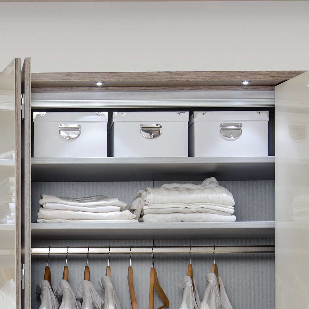 Kleiderschrank Anglesio in Creme mit Panorama Türen und Schubladen