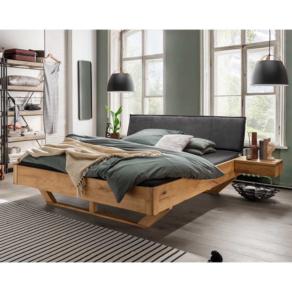 Holzkufen Bett Catania aus Wildeiche Massivholz mit Polster Kopfteil