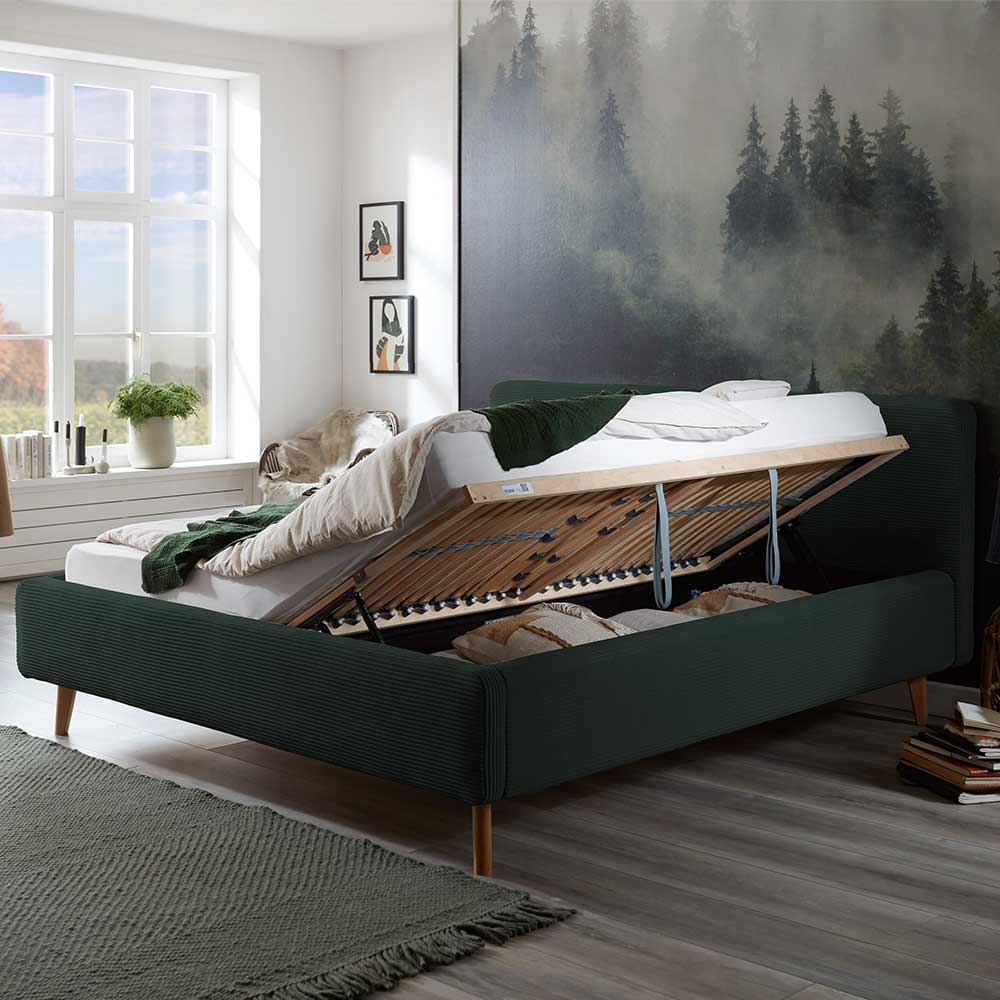 Dunkelgrünes Polster Bett Terus mit Vierfußgestell aus Holz 50 cm Einstiegshöhe