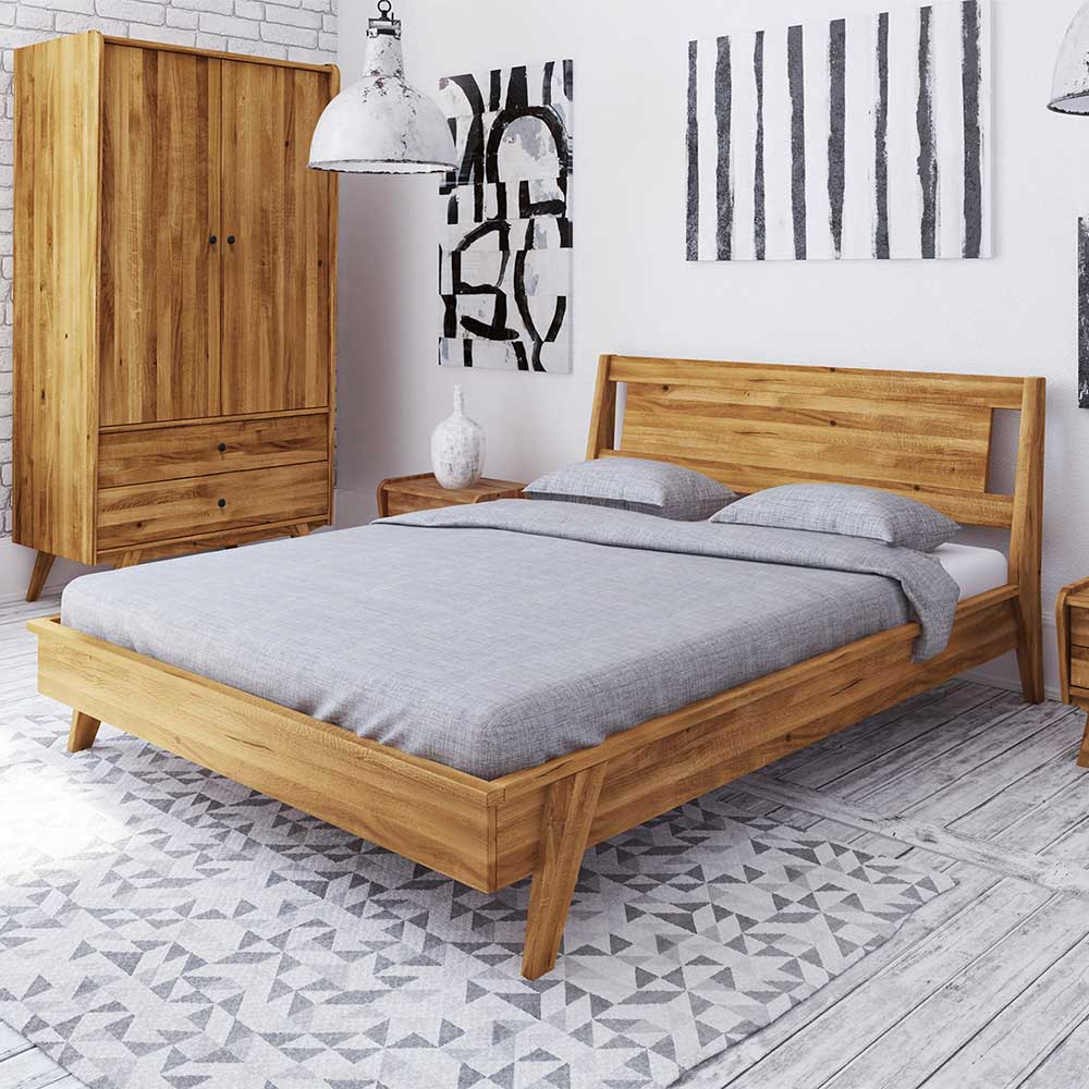 Doppelbett Carilla aus Wildeiche Massivholz im Retro Design